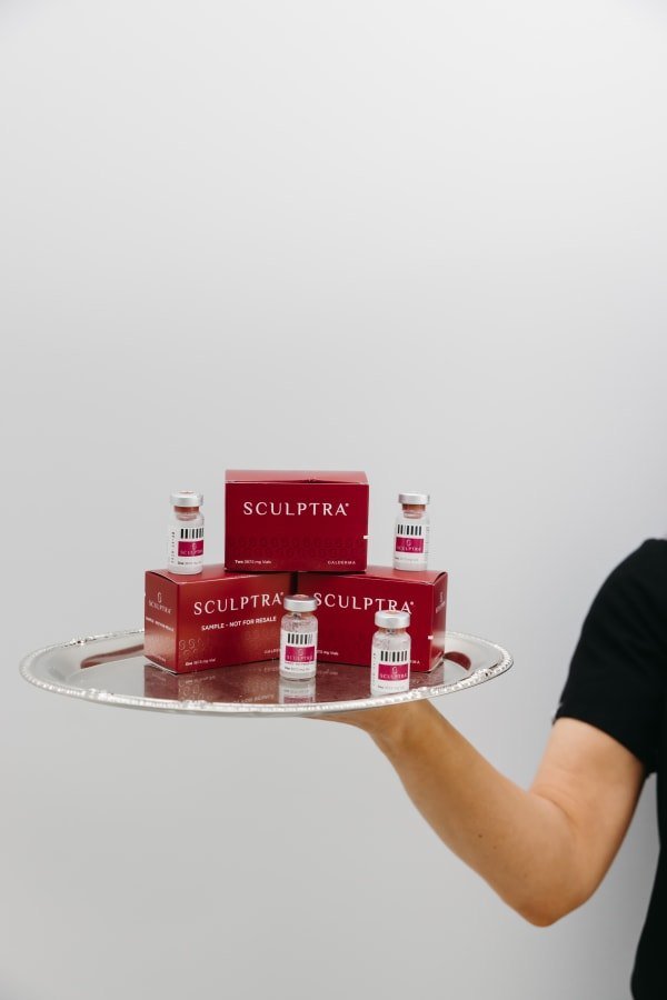 Sculptra vials and boxes presented on a silver tray at Anato Aesthetics in Scottsdale
